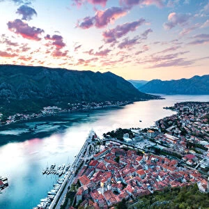 Looking over the Old Town of Kotor and across the Bay of Kotor viewed from the fortress at sunset