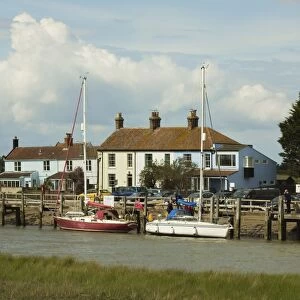 Looking across River Blyth towards houses and moored yachts on the Southwold bank, Walberswick, Suffolk, England, United Kingdom, Europe
