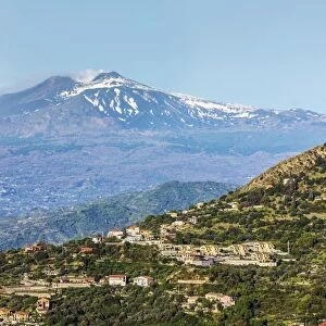 Looking from Taormina towards Trupiano and the smoking 3350m high volcano of Mount Etna during an active phase, Trupiano, Sicily, Italy, Mediterranean, Europe