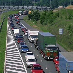 Lorries, vans and cars in a traffic jam on a road in England, United Kingdom, Europe
