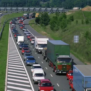 Lorries, vans and cars in a traffic jam on a road in England, United Kingdom, Europe