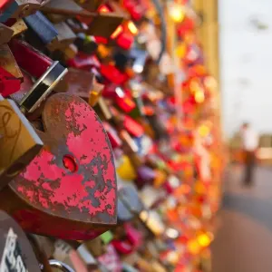 Love locks tied onto the railway bridge in Cologne, North Rhine-Westphalia, Germany, Europe