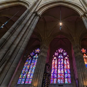 Low angle view of stained glass windows at St. Vitus Cathedral, UNESCO World Heritage Site, Prague, Bohemia, Czech Republic (Czechia), Europe
