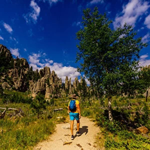 Man hiking the trails and enjoying the sights in the Black Hills of Keystone