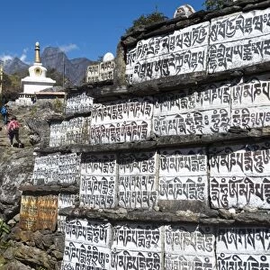Mani stones inscribed with an ancient Buddhist mantra decorate the trail to Everest Base Camp