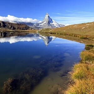 The Matterhorn reflected in Stellisee, Zermatt, Canton of Valais, Pennine Alps, Swiss Alps