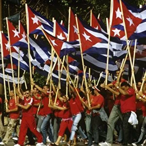 May Day marchers with Cuban flags, Plaza de la Revolucion, Havana, Cuba