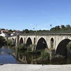 The medieval arched stone bridge across the River Lima at the town of Ponte da Barca
