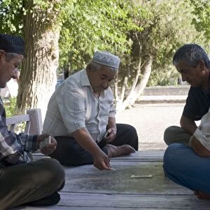 Men playing dominos, Bokhara, Uzbekistan, Central Asia, Asia