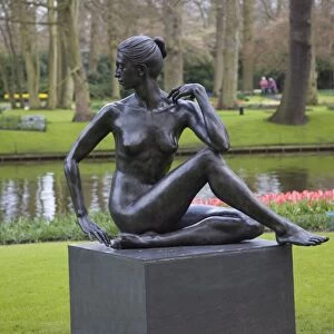 Modern sculpture of a nude woman, Keukenhof, park and gardens near Amsterdam