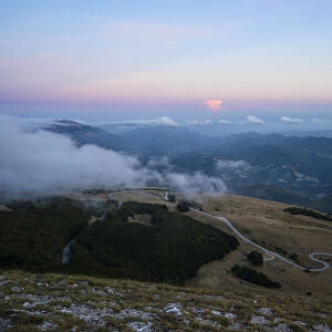 Monte Nerone at sunset on a foggy day, Apennines, Marche, Italy, Europe