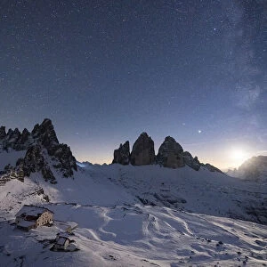 Monte Paterno, Tre Cime di Lavaredo and Rifugio Locatelli hut lit by moon