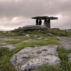 Moody sky over Poulnabrone Dolmen Portal Megalithic tomb at dusk