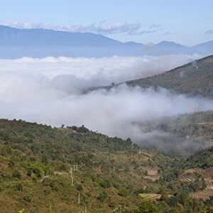 Morning fog over Kengtung and Shan hills on road to Loimwe, near Kengtung, Shan State, Myanmar (Burma), Asia