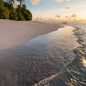 Morning light on a deserted beach on an island in the Northern Huvadhoo Atoll, Maldives, Indian Ocean, Asia