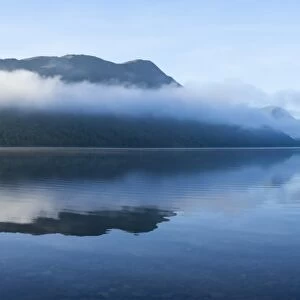 Morning mist, Lake Ullswater, Lake District National Park, Cumbria, England, United Kingdom