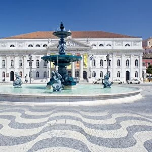 Mosaic paving and fountain with Lisbon Opera House in the background