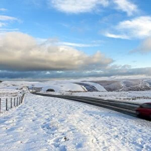 Motorists negotiate the B4520 road between Brecon and Builth Wells on the Mynydd Epynt moorland
