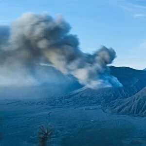 Mount Bromo volcano erupting before sunrise, East Java, Indonesia, Southeast Asia, Asia