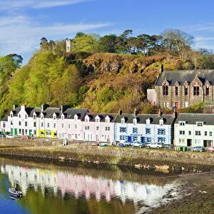 Multi-coloured houses with reflections in Portree harbour, Isle of Skye, Inner Hebrides, Highlands and Islands, Scotland, United Kingdom, Europe