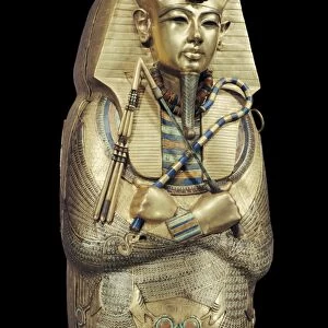 Mummiform coffin of gold with inlaid semi-precious stones and glass-paste