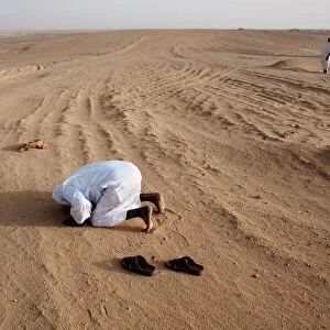 Muslims pray in the Nubian desert