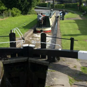 Narrow boat on the Llangollen Canal going through the locks at Grindley Brook