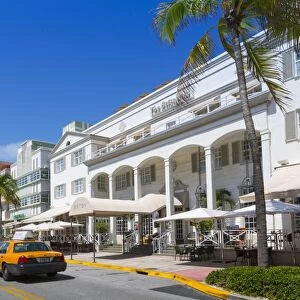 Ocean Drive and Art Deco architecture and yellow cab, Miami Beach, Miami, Florida