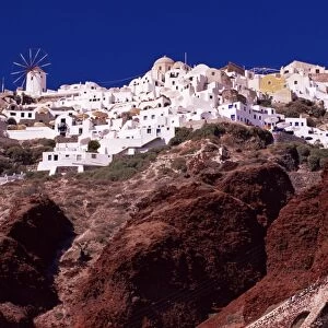 Oia village and red volcanic rocks
