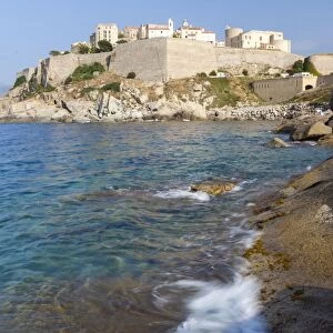 The old fortified citadel on the promontory surrounded by the clear sea, Calvi, Balagne Region