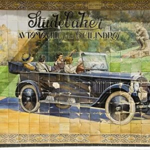 Old tile ad for Studbaker car