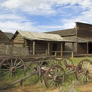 Old western wagons, restored storefronts, homes and saloons from the pioneering days of the Wild West at Cody, Montana, United States of America