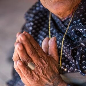 Old womans hands praying, Bhaktapur, Nepal, Asia