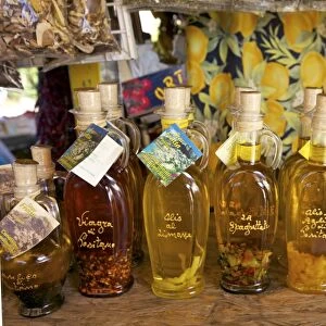 Olive oil for sale on market stall near Positano, Amalfi Coast road, Campania