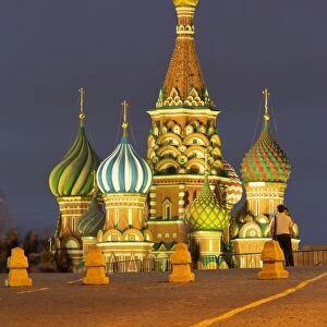 Onion domes of St. Basils Cathedral in Red Square illuminated at night, UNESCO World Heritage Site, Moscow, Russia, Europe