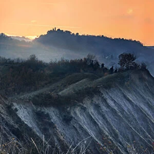 Orange sunset on badlands, Emilia Romagna, Italy, Europe