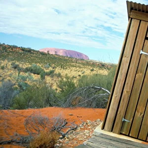 Outback dunny and Uluru (Ayers Rock), Uluru-Kata Tjuta National Park, Northern Territory