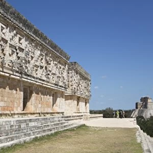 Palace of the Governor on left, with Pyramid of the Magician in the background, Uxmal