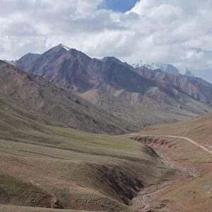 Pamir Highway leading into wilderness, Kyrgyzstan, Central Asia