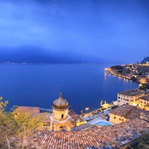 Panorama of Lake Garda and the typical town Limone Sul Garda at dusk, province of Brescia