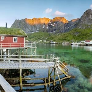 Panoramic of the fishing village surrounded by sea and midnight sun, Reine, Nordland county