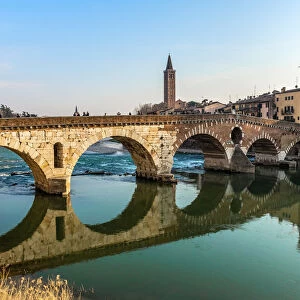Panoramic view of Ponte Pietra bridge in Verona on Adige river, Veneto region, Italy