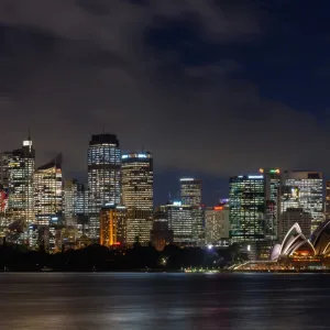 Panoramic views of Sydney city at dusk including the Opera house, Sydney, New South Wales