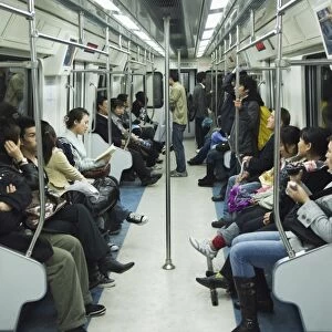 Passengers on the Beijing subway, Beijing, China, Asia