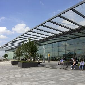 Passengers wait outside Terminal 4, Heathrow Airport, London, England, United Kingdom