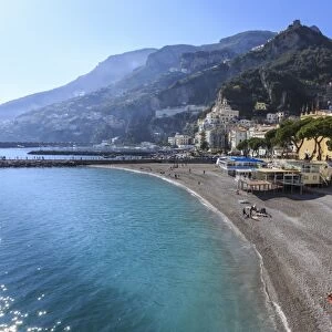 People on beach in spring sun, Amalfi, Costiera Amalfitana (Amalfi Coast), UNESCO