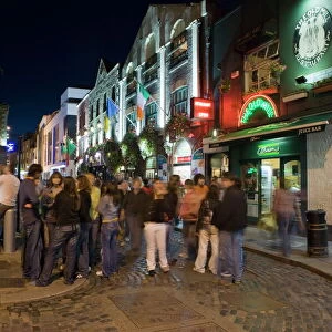 People gathered in Temple Bar, Dublin, Republic of Ireland, Europe
