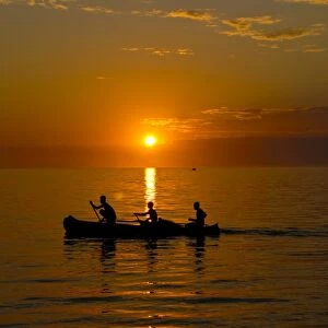 People rowing home at sunset at Ifaty, near Toliara, Madagascar, Indian Ocean, Africa