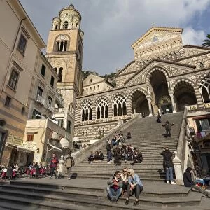 People in the sun on cathedral steps in spring, Amalfi, Costiera Amalfitana (Amalfi Coast)