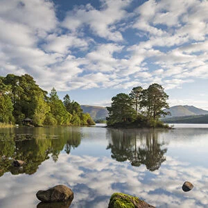 A perfect morning with reflections on Derwent Water in the Lake District National Park